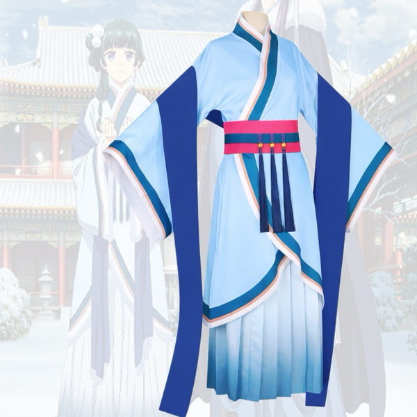 The Apothecary Diaries Maomao Winter Costume.Traditional outfit with blue and white design on a mannequin against a blurred traditional architectural background.